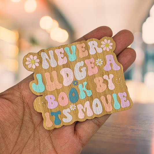 "NEVER JUDGE A BOOK BY ITS MOVIE" Bamboo Wood Sticker