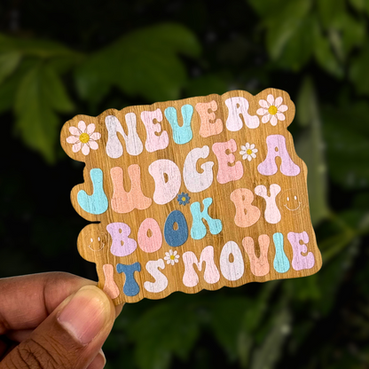 "NEVER JUDGE A BOOK BY ITS MOVIE" Bamboo Wood Sticker