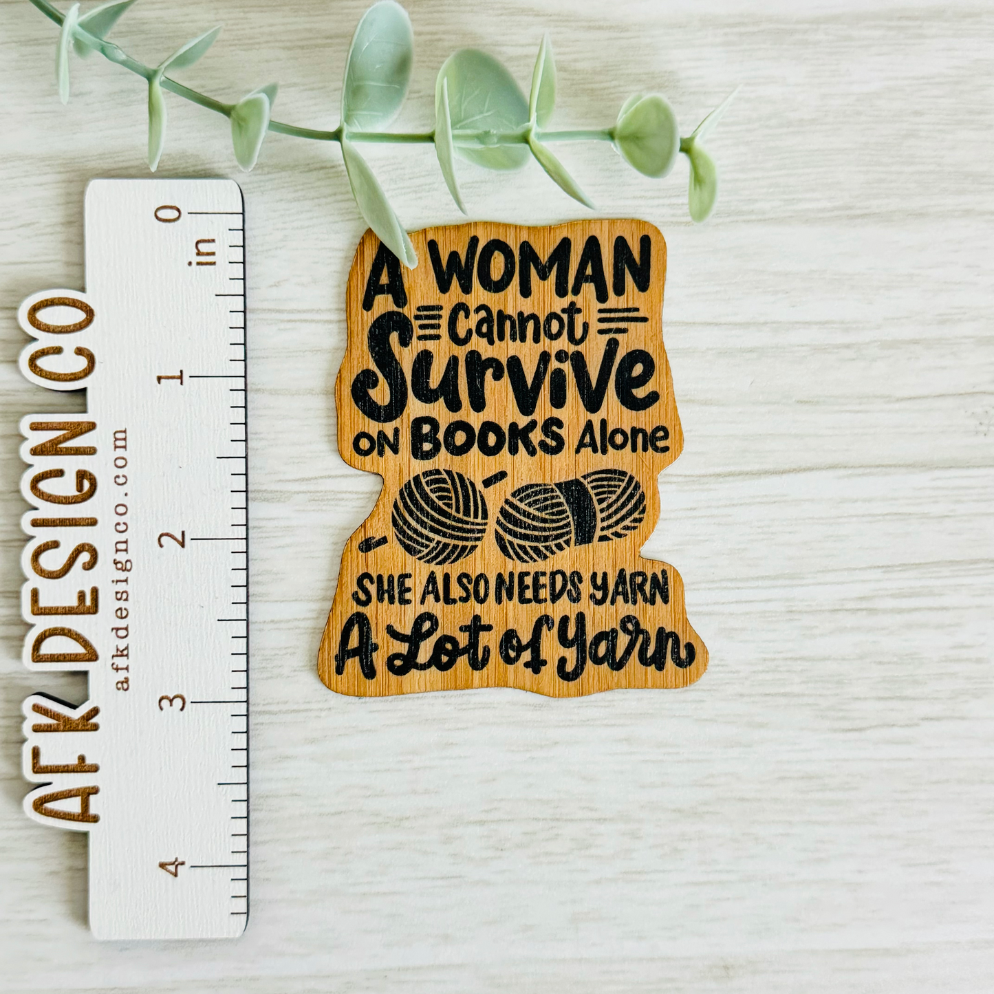 "A WOMAN CANNOT SURVIVE..." Bamboo Wood Sticker